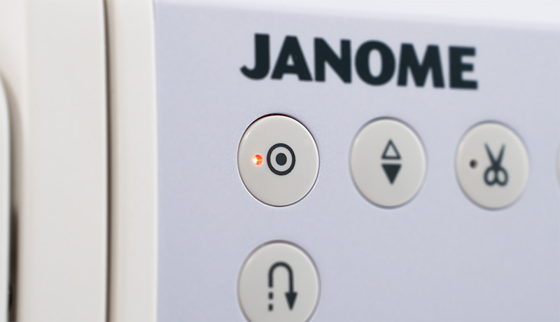 Janome Continental M6 Auto-lock button